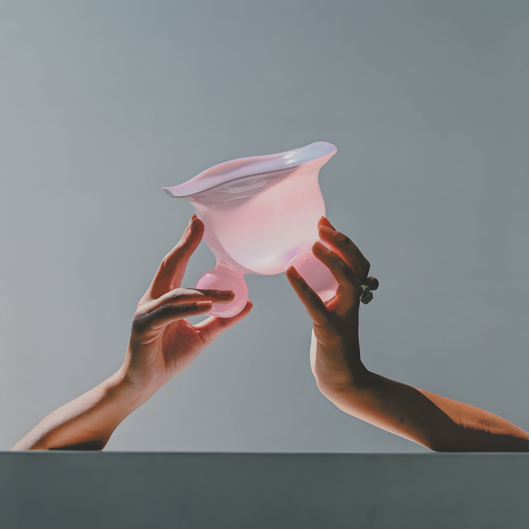 Candy Bowl in Pastel Milky Pink – A delicate, hand-blown borosilicate glass bowl with a soft, dreamy pink hue. Its smooth, rounded form and subtle opacity create a playful yet elegant presence, perfect for serving treats or adorning a tabletop.